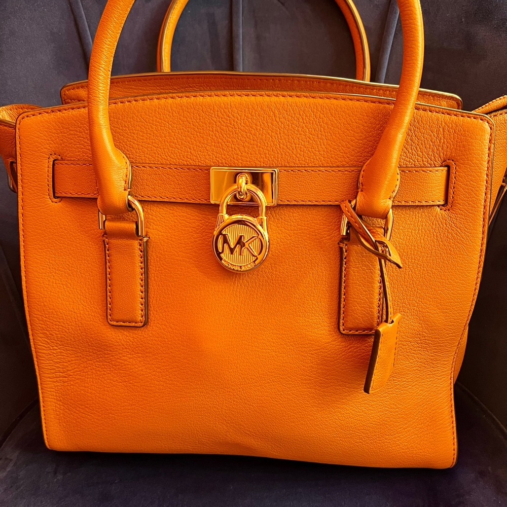 Michael Kors Hamilton purse in tan with large tan wallet.